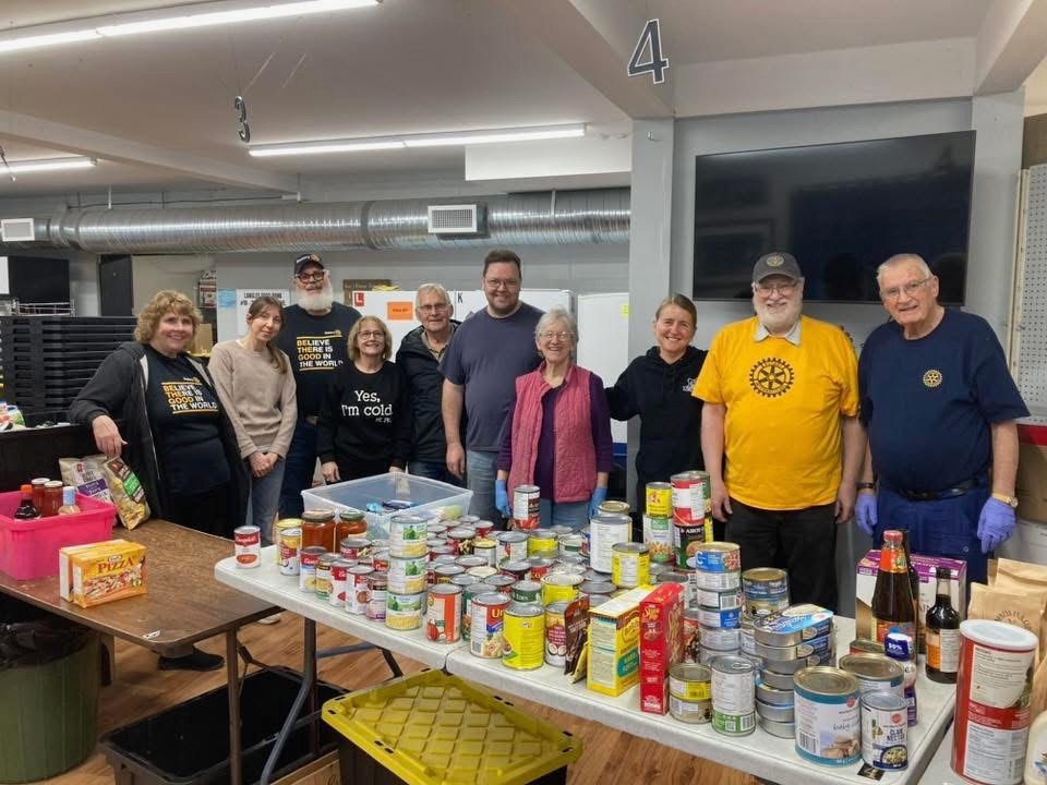 Jami volunteering at the food bank with Rotary.